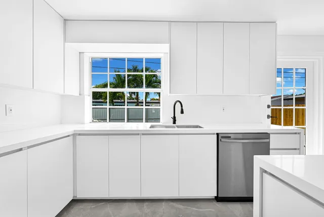 an empty room with entrance and door