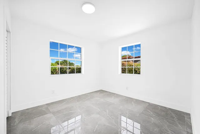 an empty room with an entryway