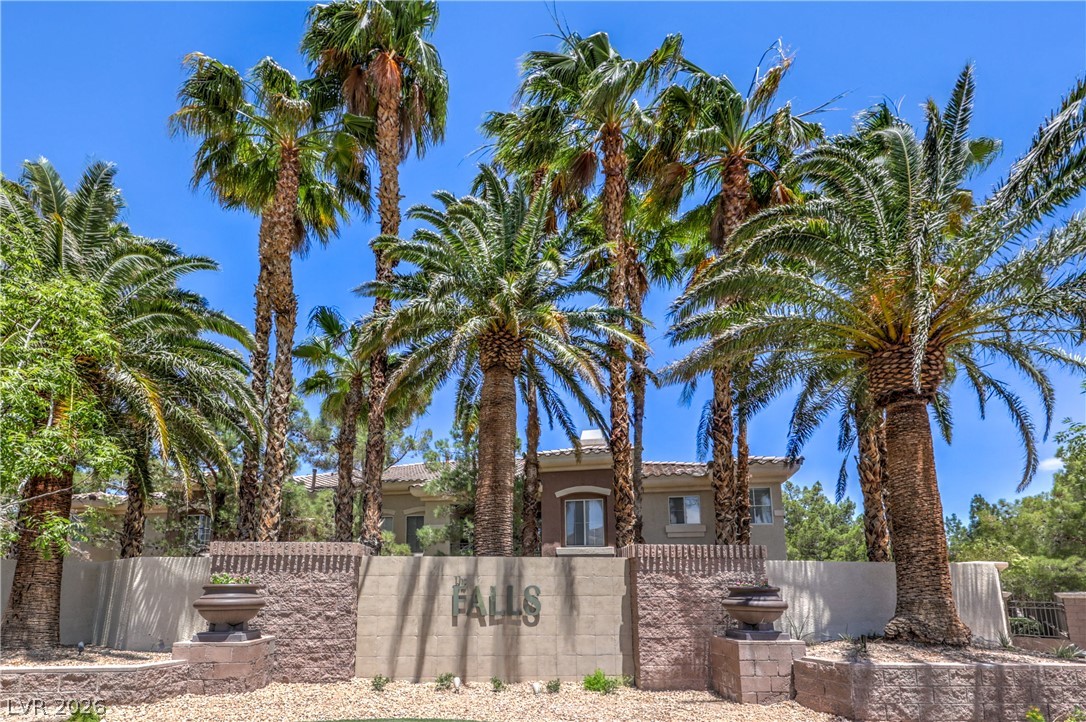 9050 West Warm Springs Road, Unit 2033 Las Vegas, NV 89148 - Photo 28 of 30 A grand entrance welcomes residents and visitors to a private, tree-lined community.