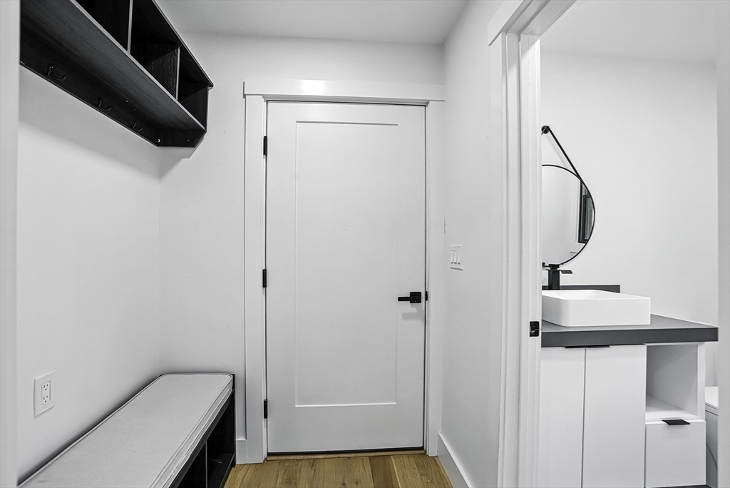 68 Pearl Street Upton, MA 01568 - Photo 11 of 37 a bathroom with a sink and a mirror