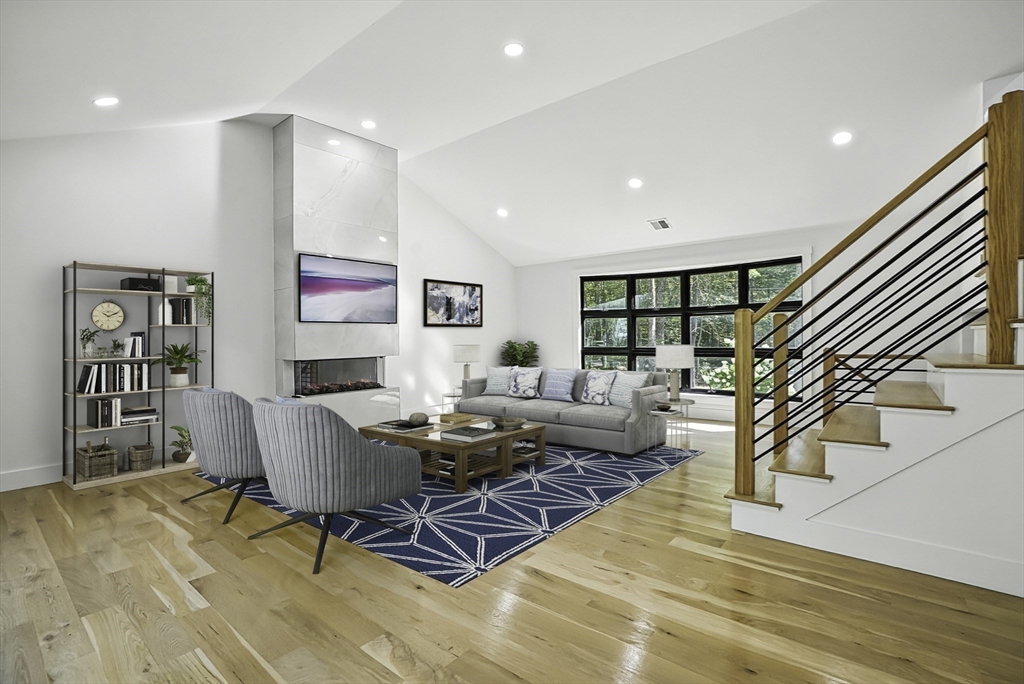 68 Pearl Street Upton, MA 01568 - Photo 13 of 37 a living room with furniture and wooden floor