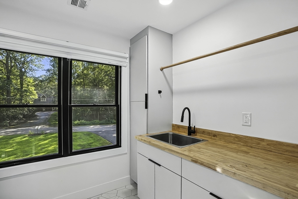 68 Pearl Street Upton, MA 01568 - Photo 17 of 37 a kitchen with a large window