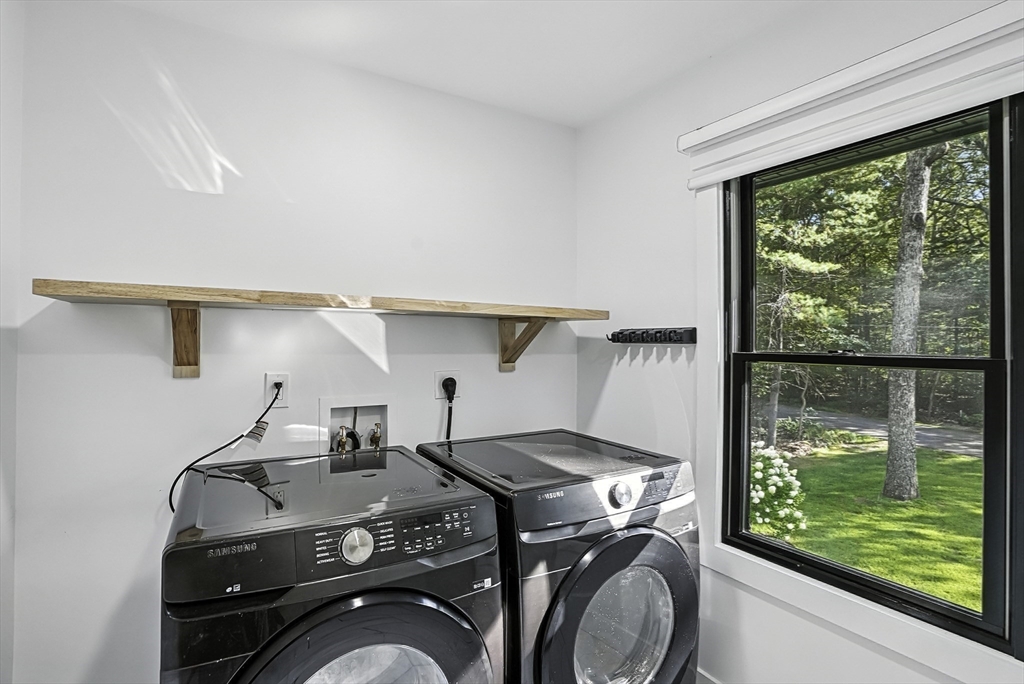 68 Pearl Street Upton, MA 01568 - Photo 18 of 37 a utility room with dryer and washer