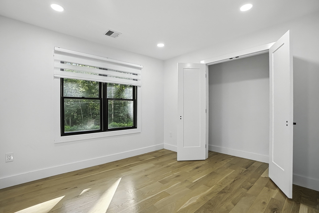 68 Pearl Street Upton, MA 01568 - Photo 20 of 37 a view of an empty room with a window