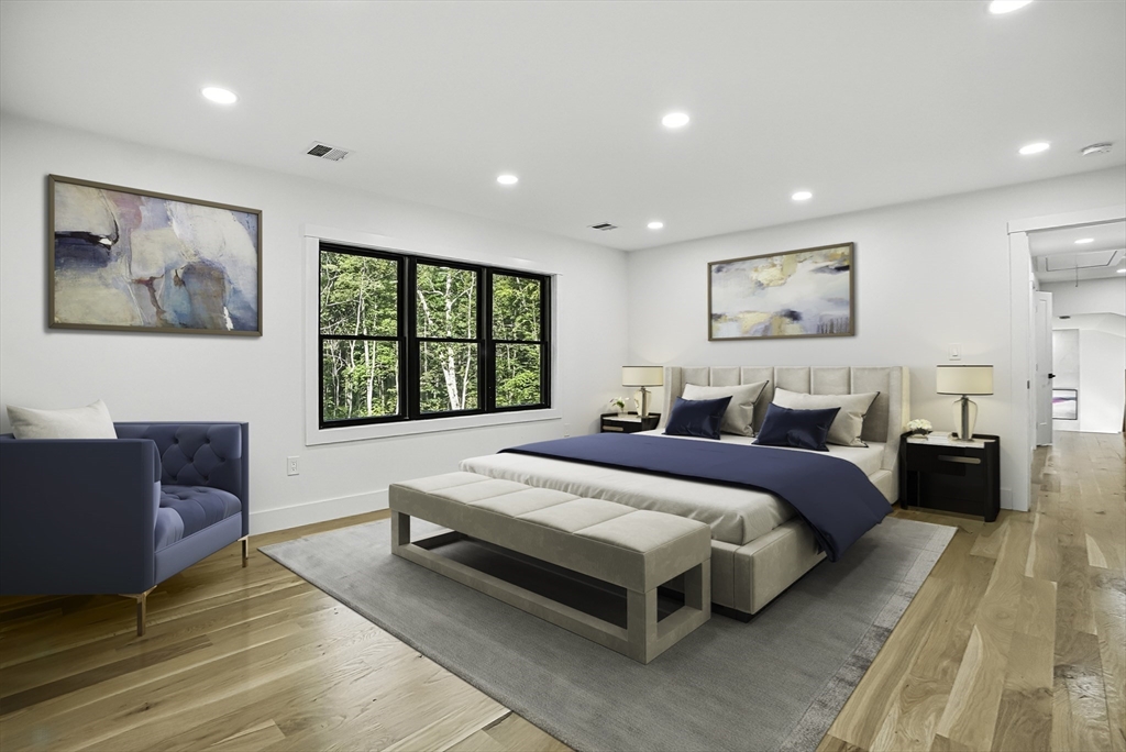 68 Pearl Street Upton, MA 01568 - Photo 23 of 37 a spacious bedroom with a large bed and a window
