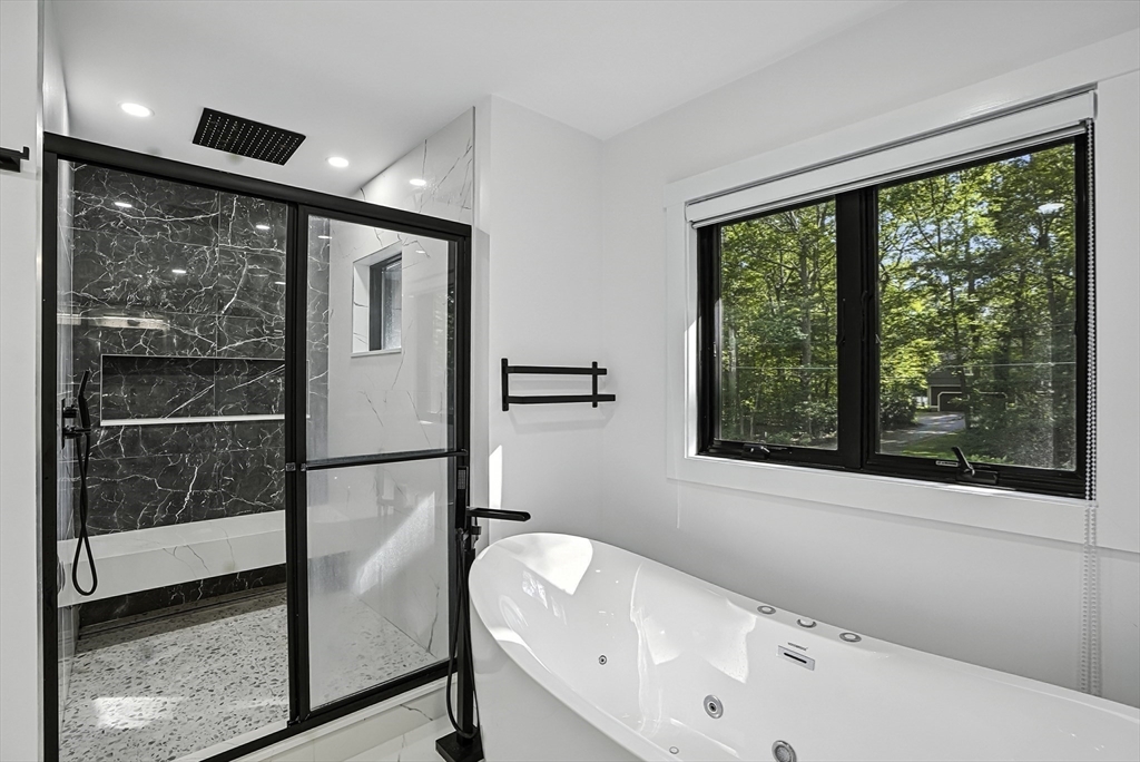 68 Pearl Street Upton, MA 01568 - Photo 27 of 37 a bathroom with a bathtub and a shower