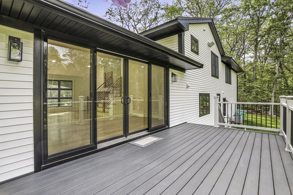 68 Pearl Street Upton, MA 01568 - Photo 32 of 37 a view of porch with wooden floor