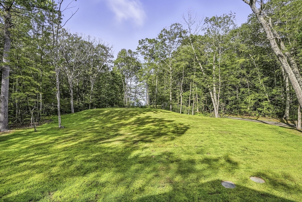 68 Pearl Street Upton, MA 01568 - Photo 35 of 37 a swimming pool with trees in the background