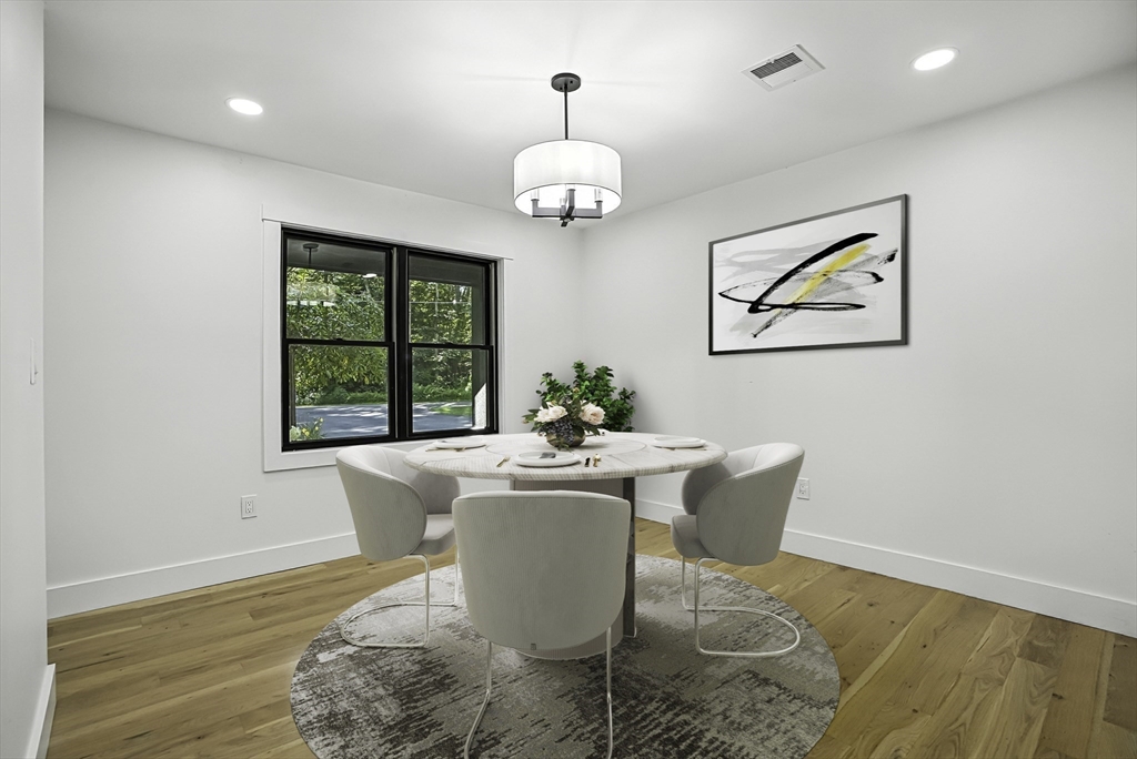 68 Pearl Street Upton, MA 01568 - Photo 9 of 37 a dining room with table and chairs