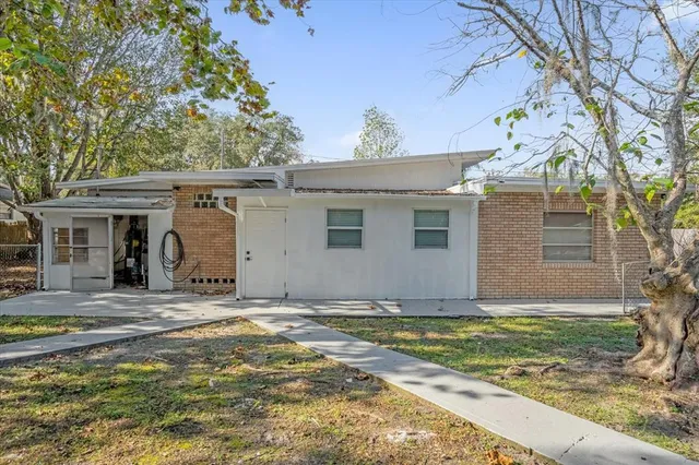 a view of yard along with trees