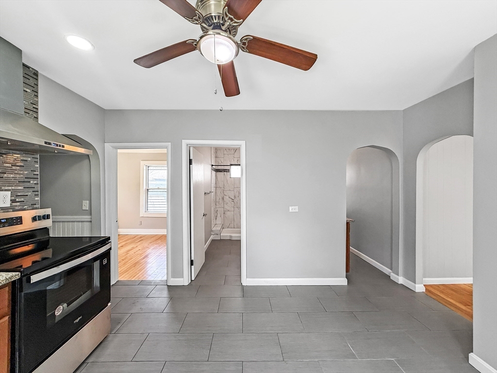 70 Cutler Street Worcester, MA 01604 - Photo 12 of 42 a view of a kitchen with a sink and a stove top oven