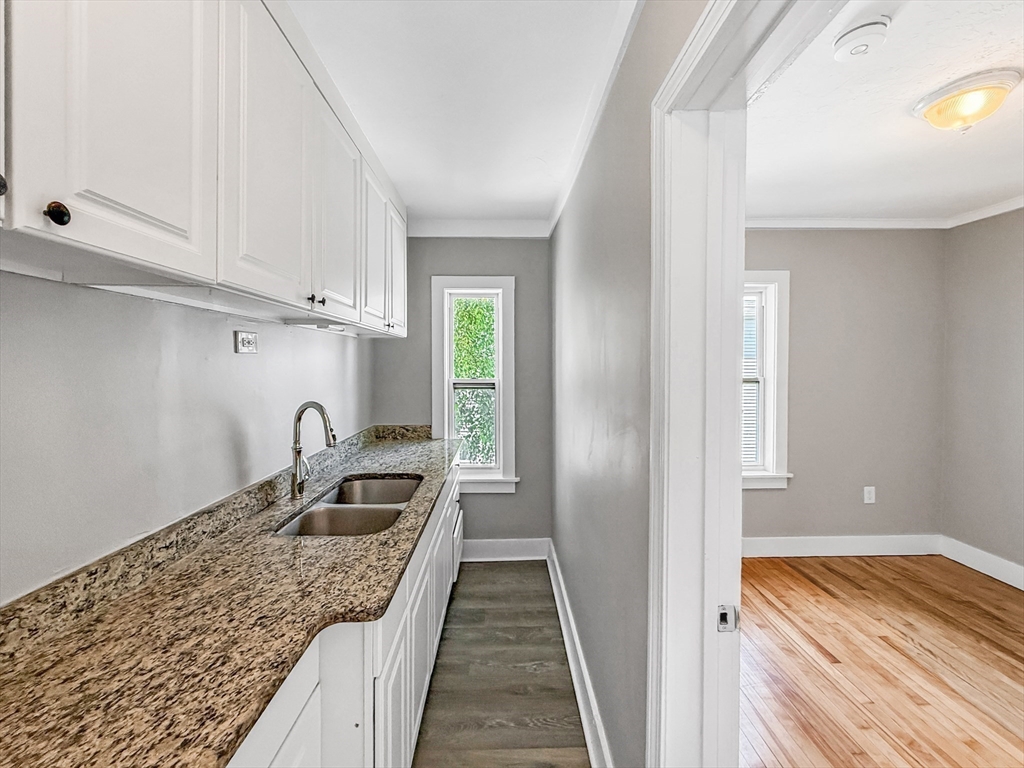 70 Cutler Street Worcester, MA 01604 - Photo 30 of 42 a kitchen with a sink and cabinets