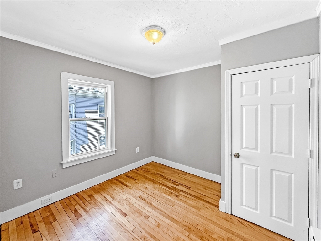 70 Cutler Street Worcester, MA 01604 - Photo 31 of 42 an empty room with windows