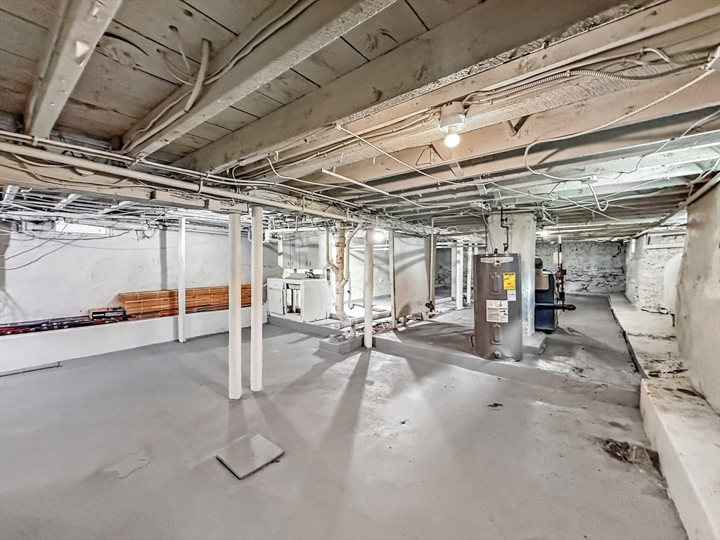 70 Cutler Street Worcester, MA 01604 - Photo 37 of 42 a view of a studio with wooden shelves