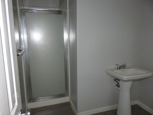 12127 Landsdown Ridge Way Humble, TX 77346 - Photo 12 of 35 a bathroom with a sink and mirror