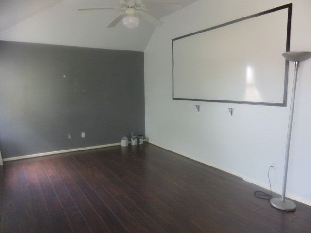 12127 Landsdown Ridge Way Humble, TX 77346 - Photo 23 of 35 an empty room with wooden floor and mirror