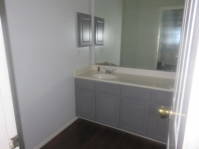 12127 Landsdown Ridge Way Humble, TX 77346 - Photo 26 of 35 a bathroom with a sink and vanity