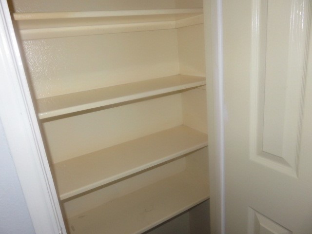 12127 Landsdown Ridge Way Humble, TX 77346 - Photo 27 of 35 a close up view of racks on the wall