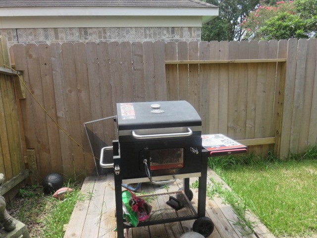 12127 Landsdown Ridge Way Humble, TX 77346 - Photo 30 of 35 a patio with table and chairs