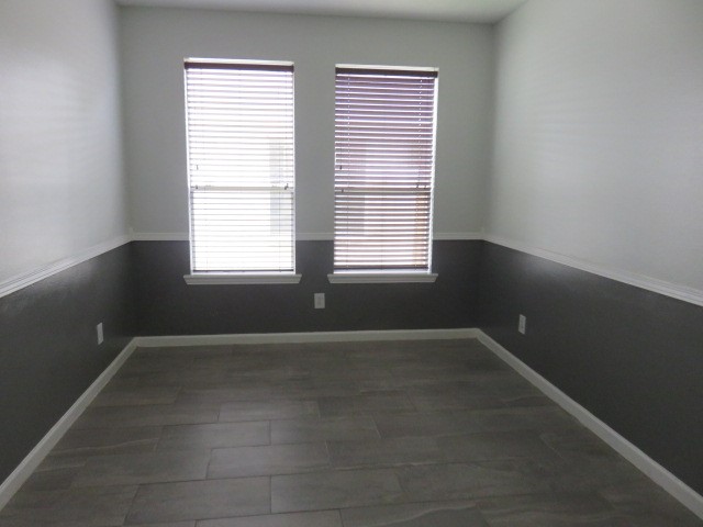 12127 Landsdown Ridge Way Humble, TX 77346 - Photo 8 of 35 a view of an empty room with a window