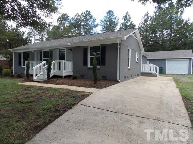 5624 Pelham Road Durham, NC 27713 - Photo 1 of 15 a front view of house with yard outdoor seating and barbeque oven