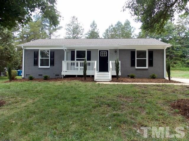 5624 Pelham Road Durham, NC 27713 - Photo 2 of 15 a front view of house with yard and green space