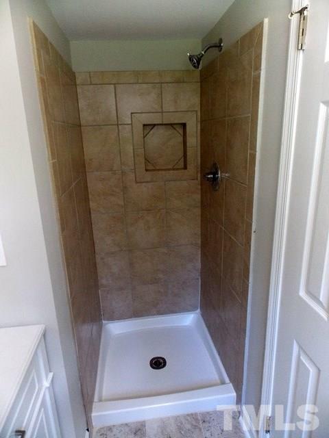 5624 Pelham Road Durham, NC 27713 - Photo 11 of 15 a bathroom with a shower