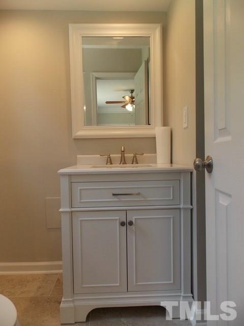 5624 Pelham Road Durham, NC 27713 - Photo 12 of 15 a bathroom with a sink and a mirror