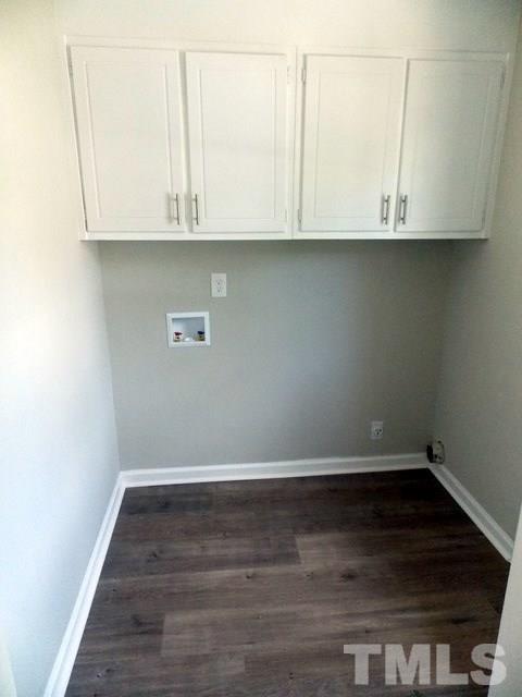 5624 Pelham Road Durham, NC 27713 - Photo 14 of 15 a view of cabinets and wooden floor