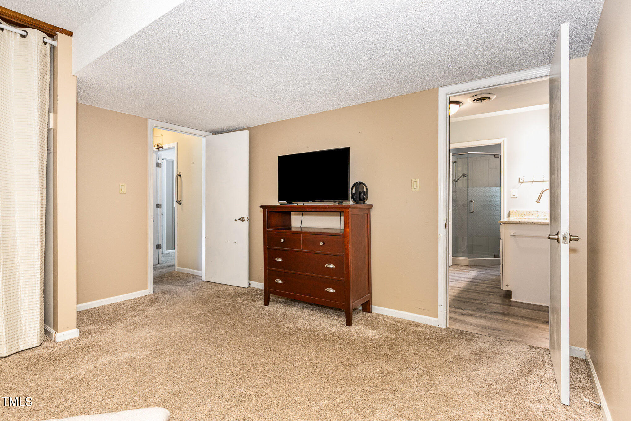 6609 Electra Drive Raleigh, NC 27607 - Photo 20 of 35 downstairs bed to bath