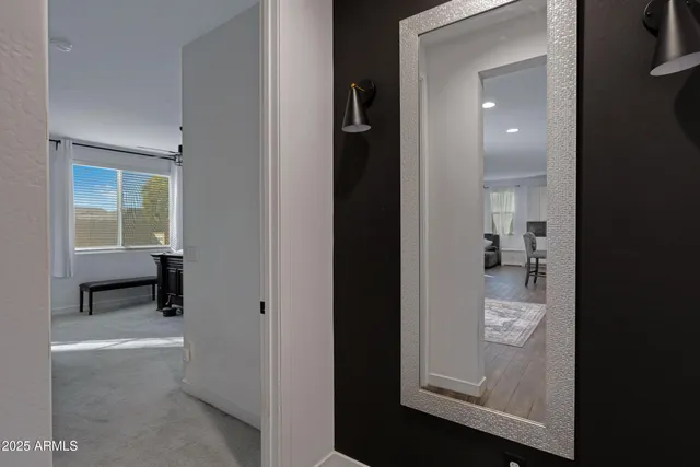 a bed room with a bed and a window