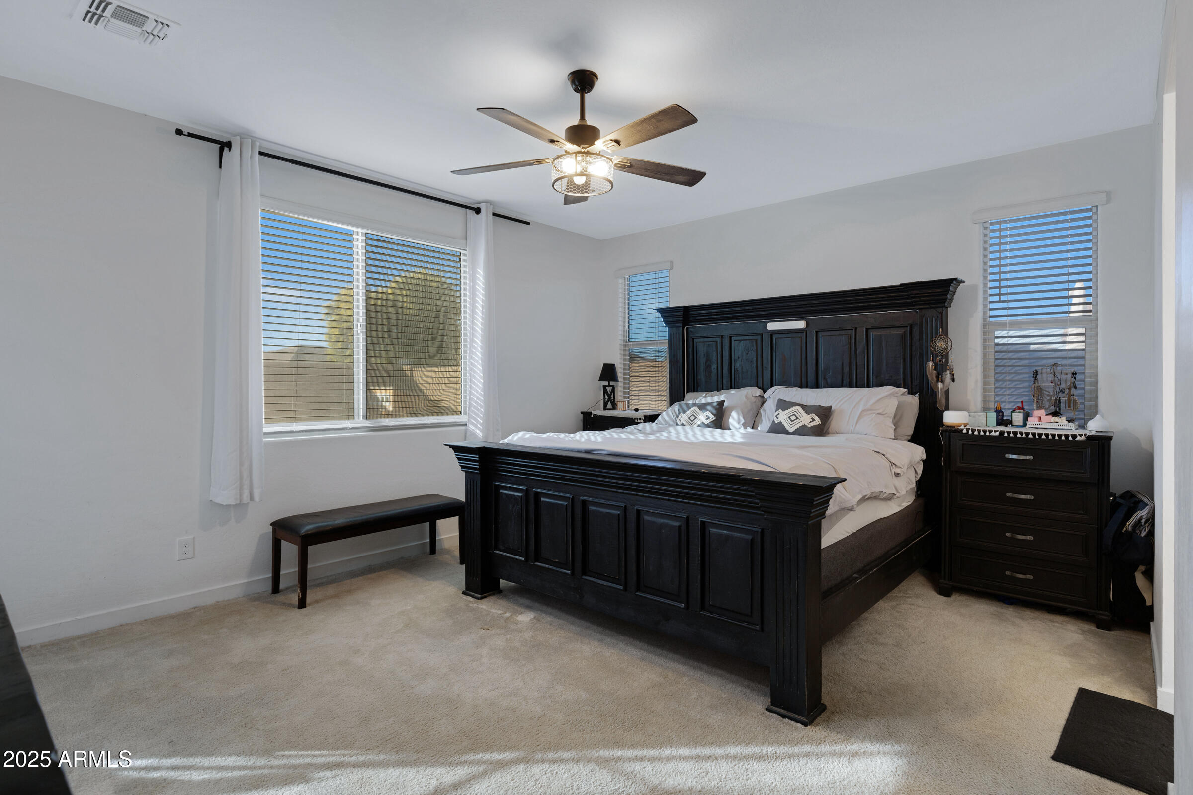 24450 Seed Road Florence, AZ 85132 - Photo 25 of 39 a bed room with a bed and a window