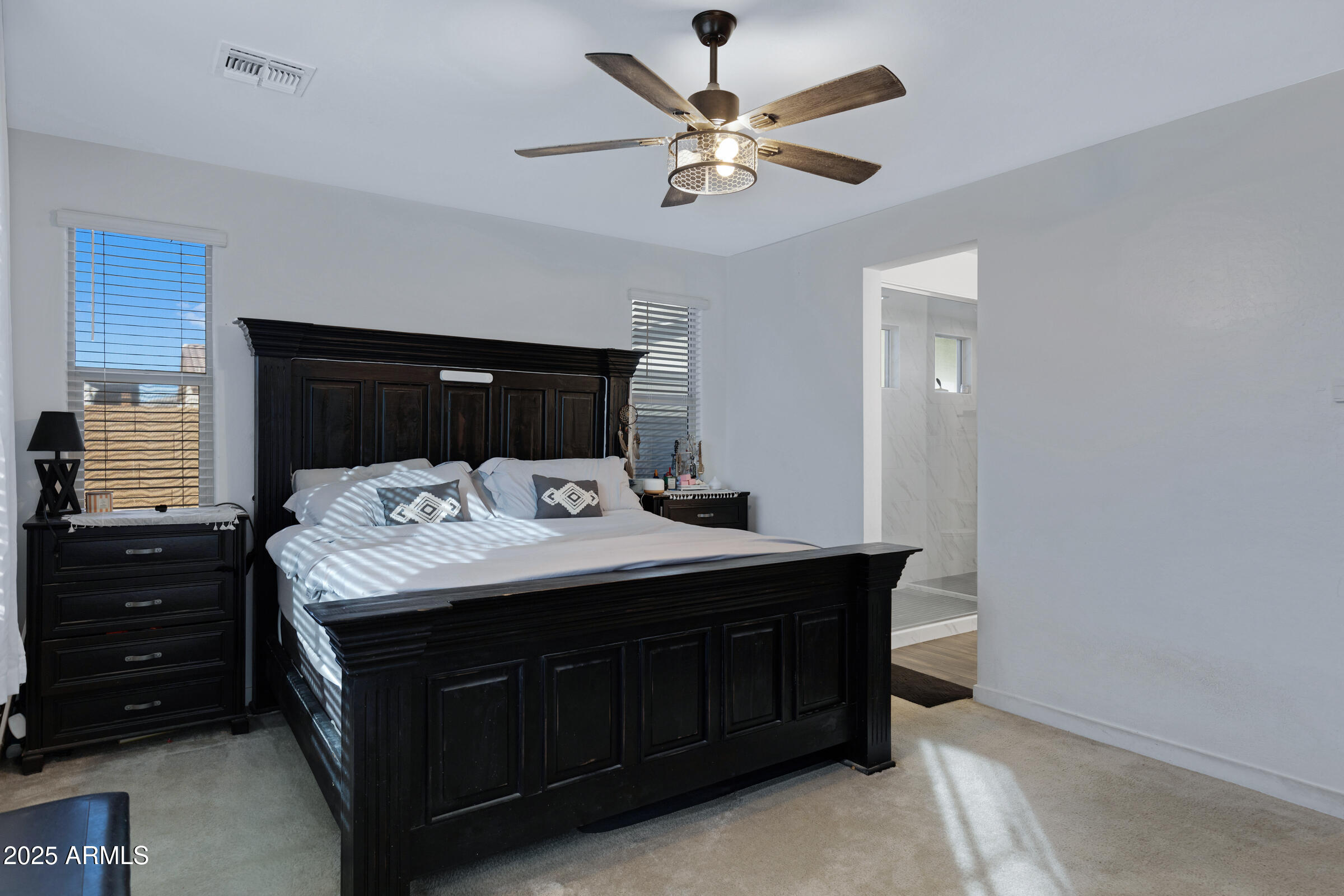 24450 Seed Road Florence, AZ 85132 - Photo 27 of 39 a bathroom with a sink vanity and a mirror