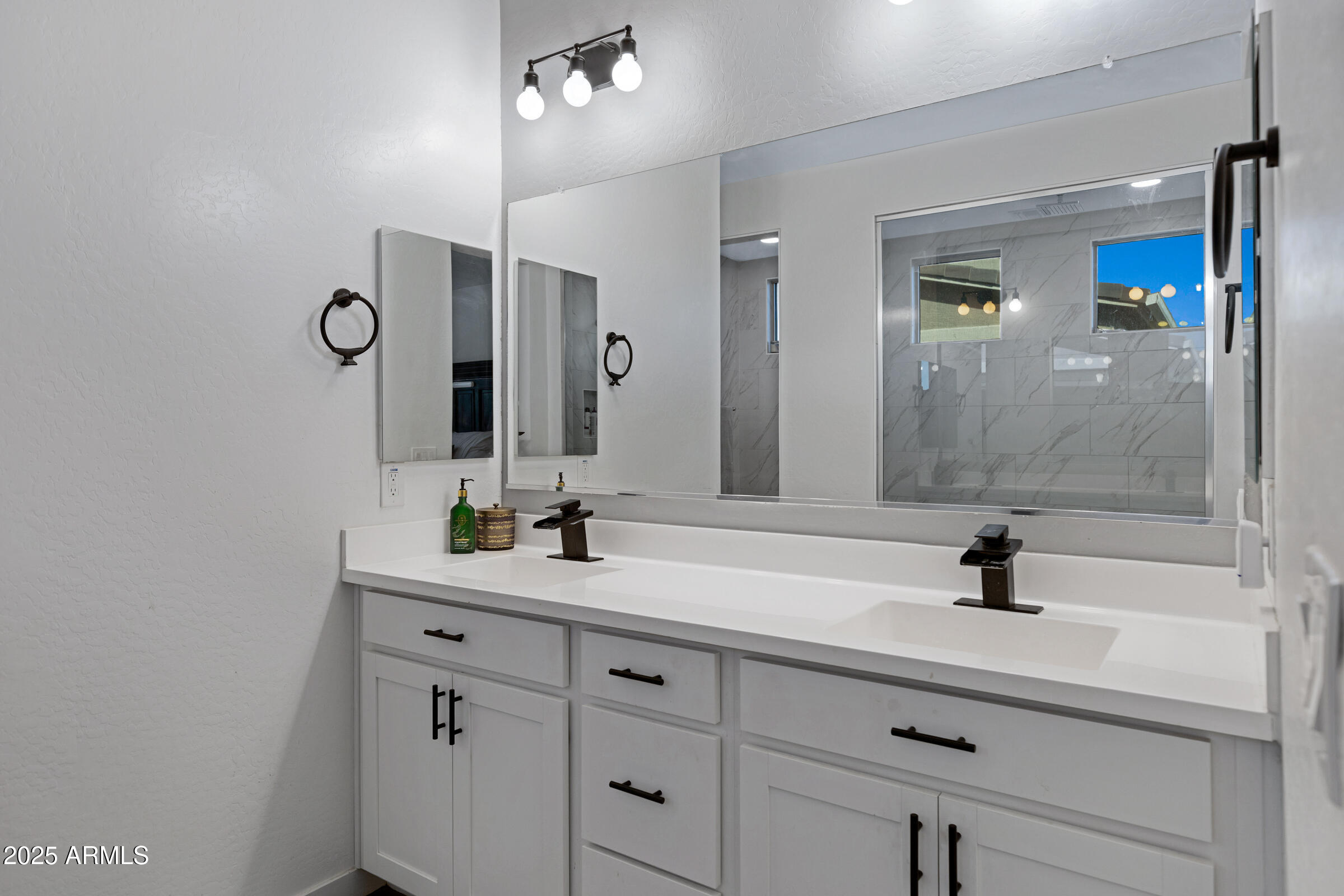 24450 Seed Road Florence, AZ 85132 - Photo 28 of 39 a bathroom with a sink and a mirror