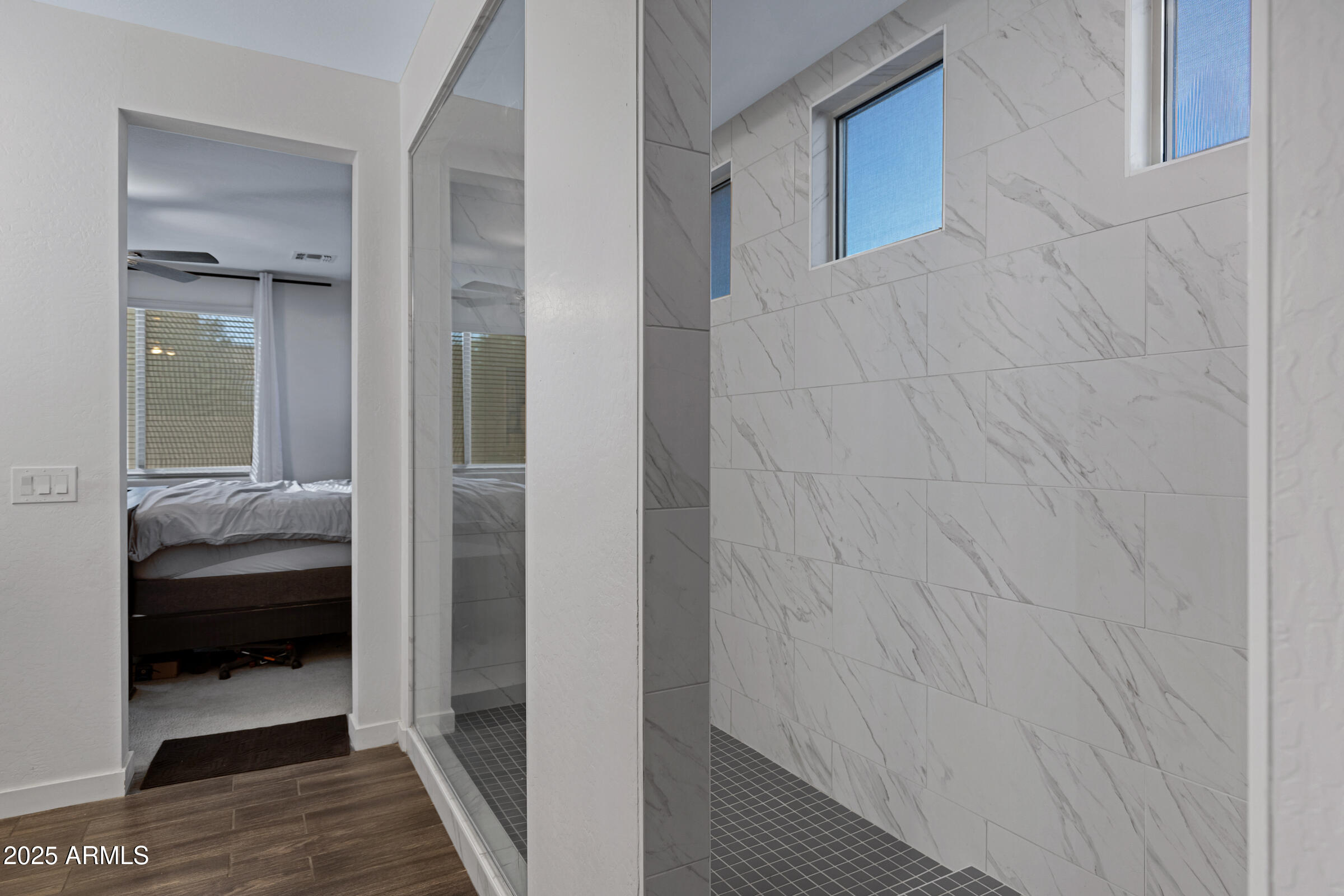 24450 Seed Road Florence, AZ 85132 - Photo 29 of 39 a view of a bedroom from a hallway