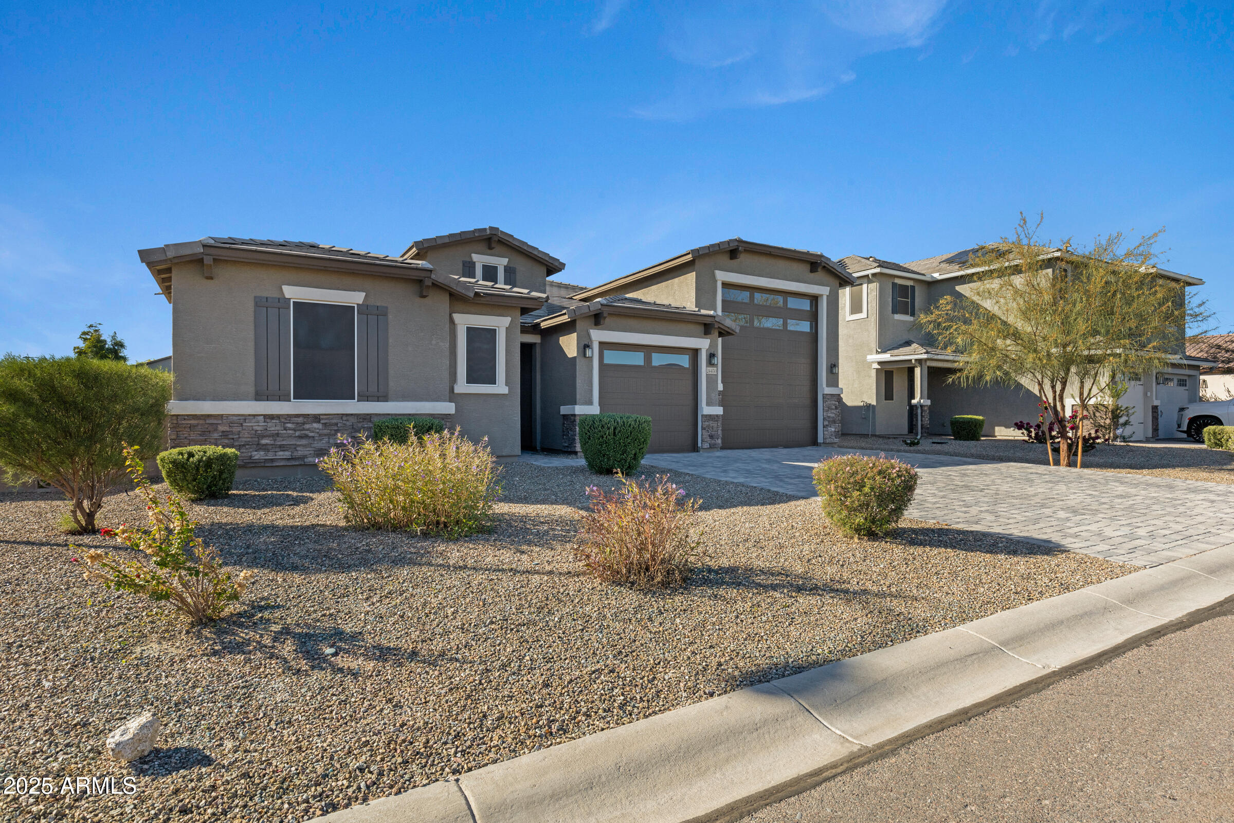 24450 Seed Road Florence, AZ 85132 - Photo 3 of 39 a front view of a house with garden