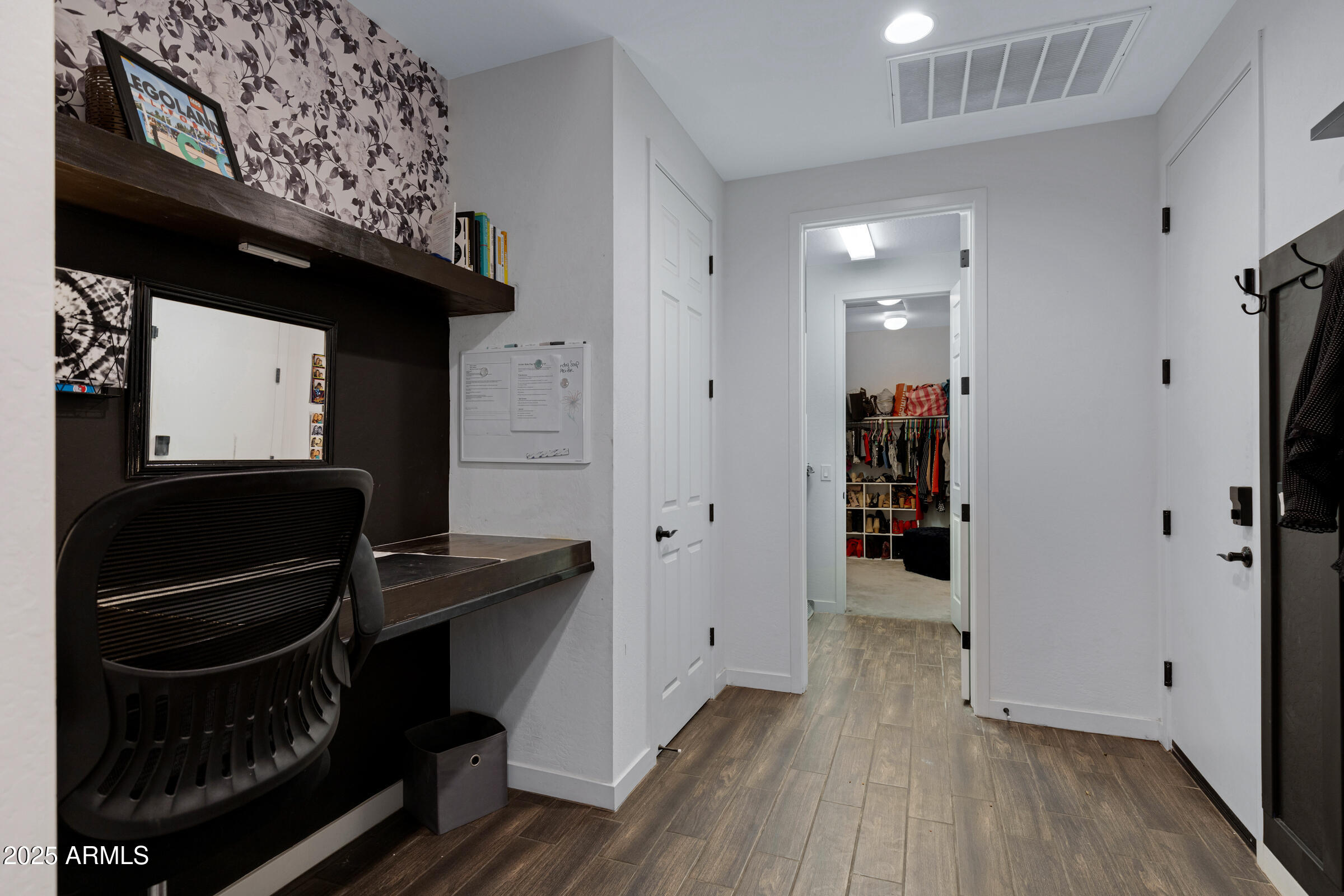 24450 Seed Road Florence, AZ 85132 - Photo 32 of 39 a view of an entryway with wooden floor
