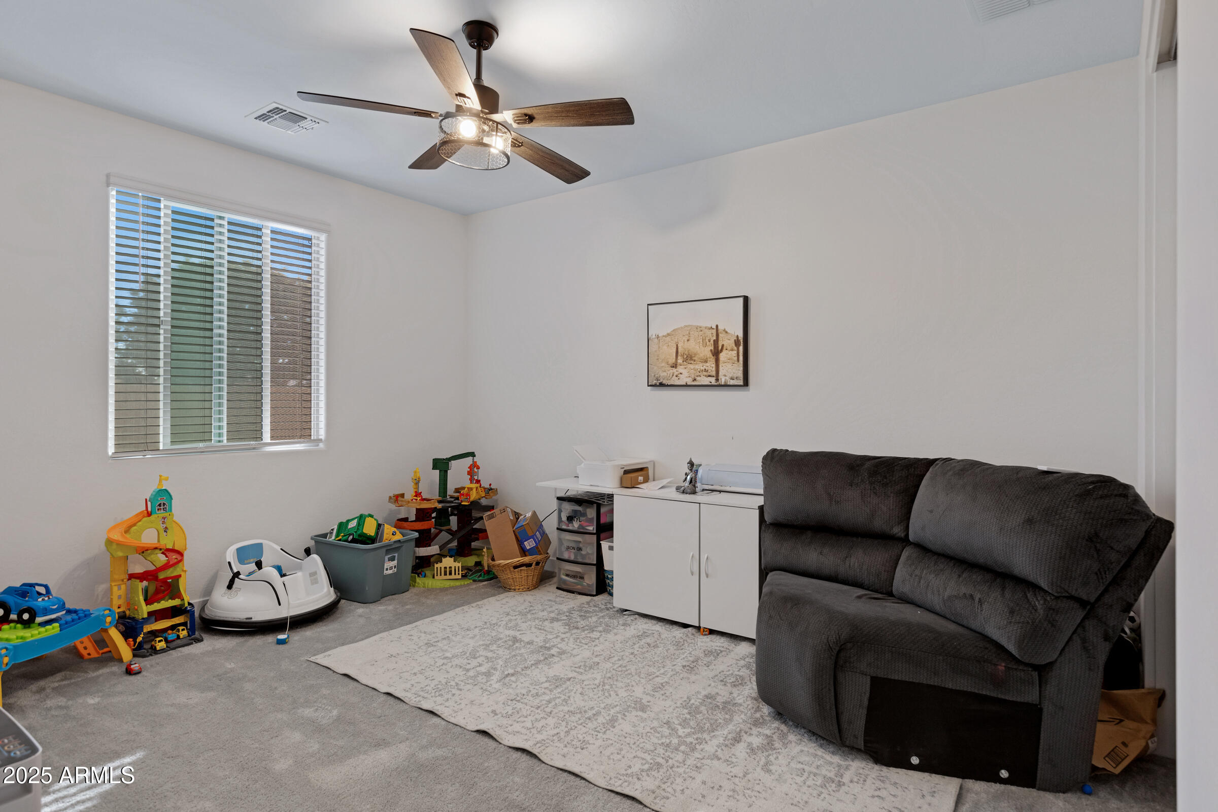 24450 Seed Road Florence, AZ 85132 - Photo 8 of 39 a living room with furniture and a window