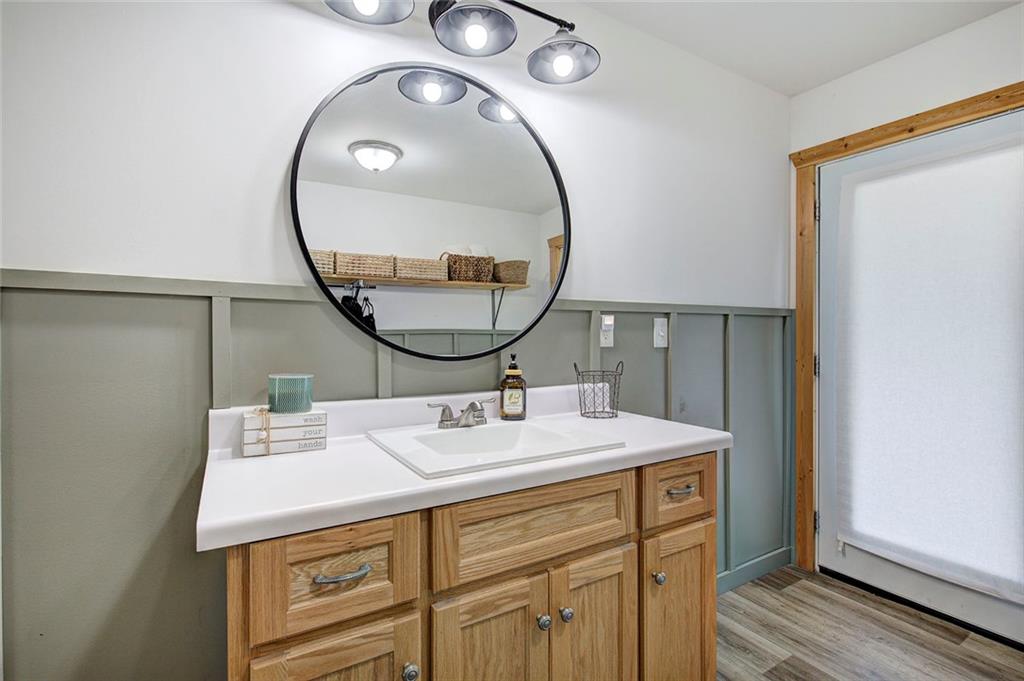 765 Addison Road Buchanan, GA 30113 - Photo 25 of 50 a bathroom with a sink and a mirror