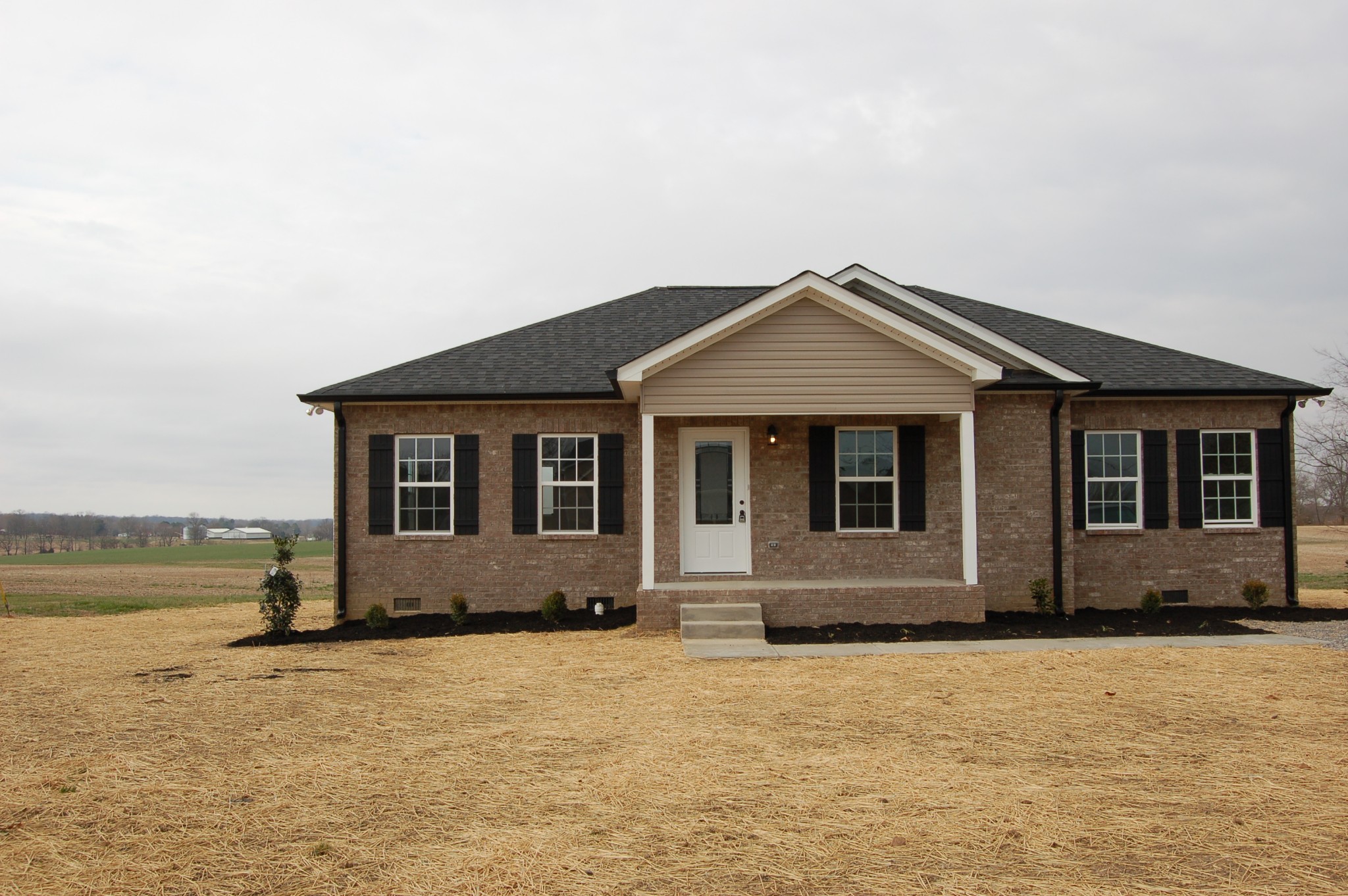 183 Scattersville Road Portland, TN 37148 - Photo 1 of 11 a front view of a house with a yard