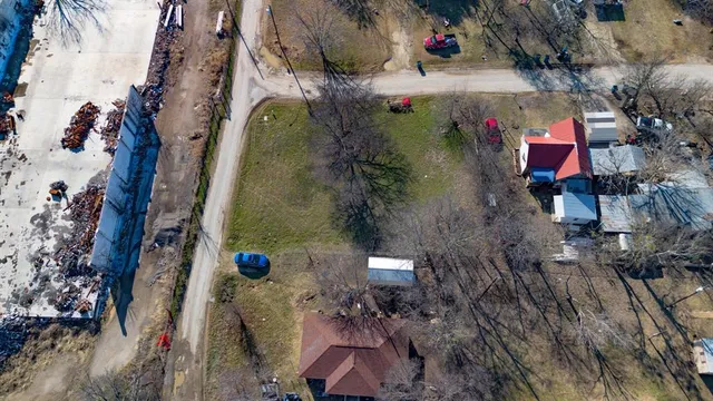 an aerial view of houses and roads