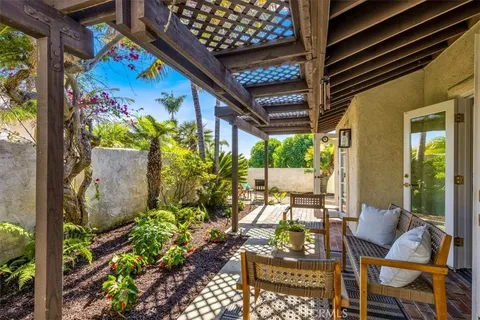 a view of a potted plant with sign of front of it