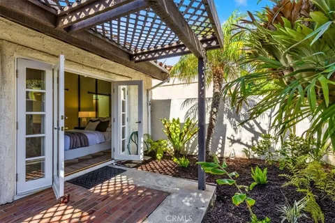 an aerial view of a house with a garden