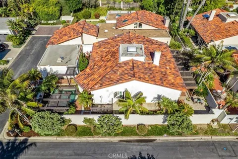 a view of swimming pool with outdoor seating and yard in the back