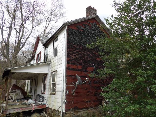 1047 Cinder Road Dunbar, PA 15431 - Photo 20 of 20 a view of a house with a tree