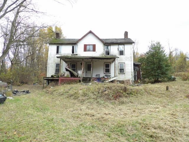 1047 Cinder Road Dunbar, PA 15431 - Photo 7 of 20 a view of a house with a yard