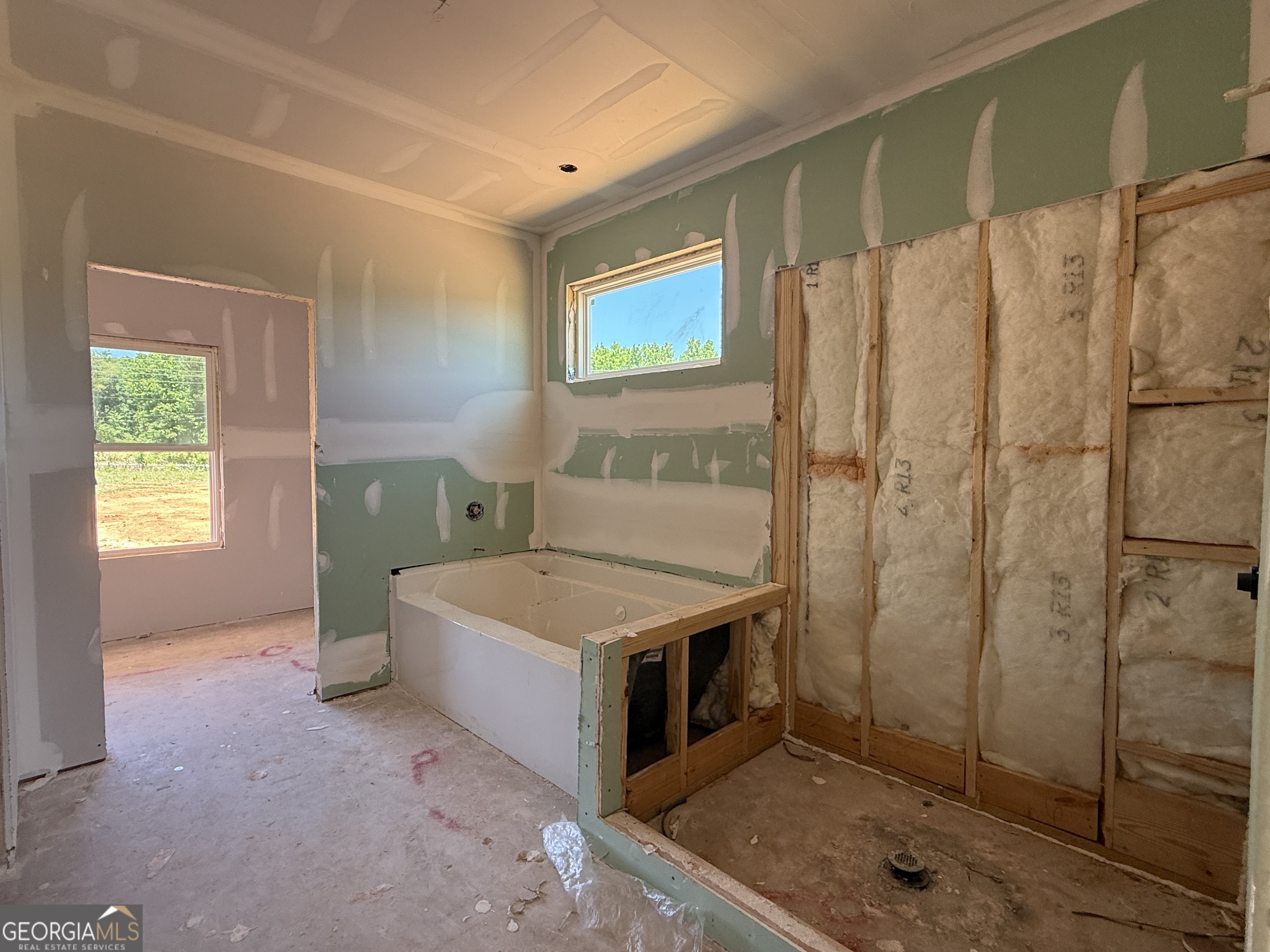 10 Rex Road Williamson, GA 30292 - Photo 11 of 63 a bathroom with a tub sink and shower