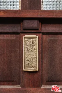 a living room with furniture fireplace and window