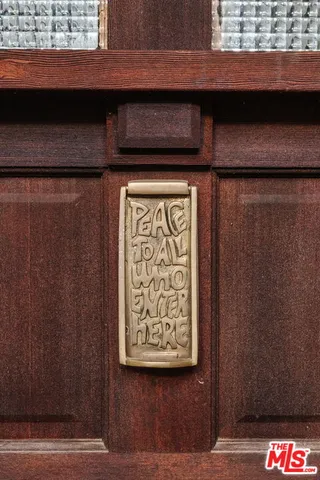 a living room with furniture fireplace and window