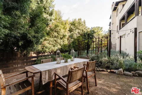 a view of a forest with lots of trees